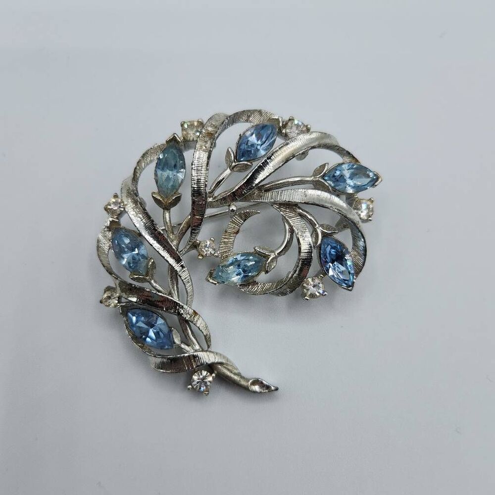 Vtg Lisner Signed Rhinestone Scroll Leaf Costume Brooch Ice Blue Silver-tone
